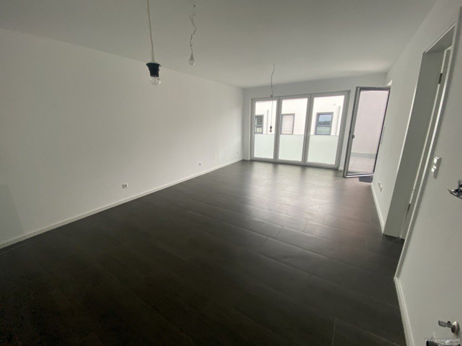 Wohnzimmer mit offener K�che Etagenwohnung G�tersloh