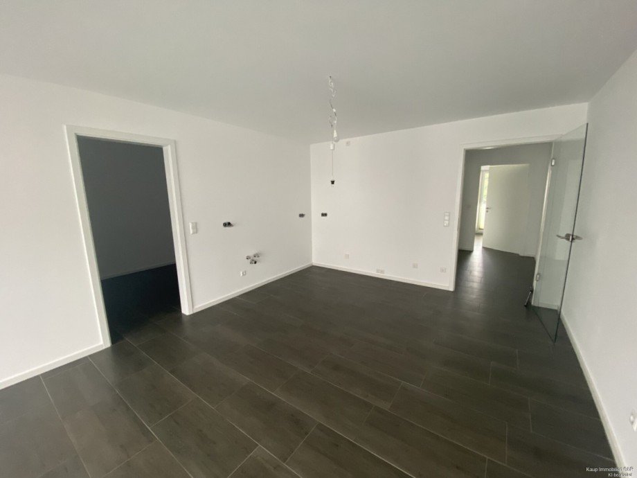 Wohnzimmer mit offener K�che Etagenwohnung G�tersloh