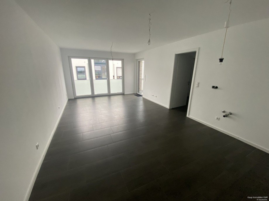 Wohnzimmer mit offener K�che Etagenwohnung G�tersloh