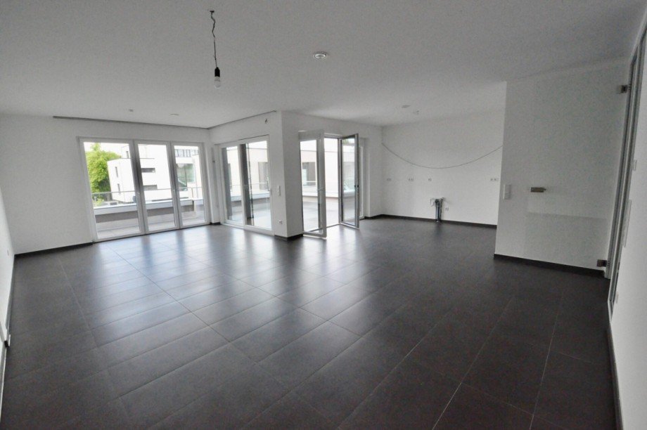 Wohnzimmer mit offener K�che Penthousewohnung G�tersloh